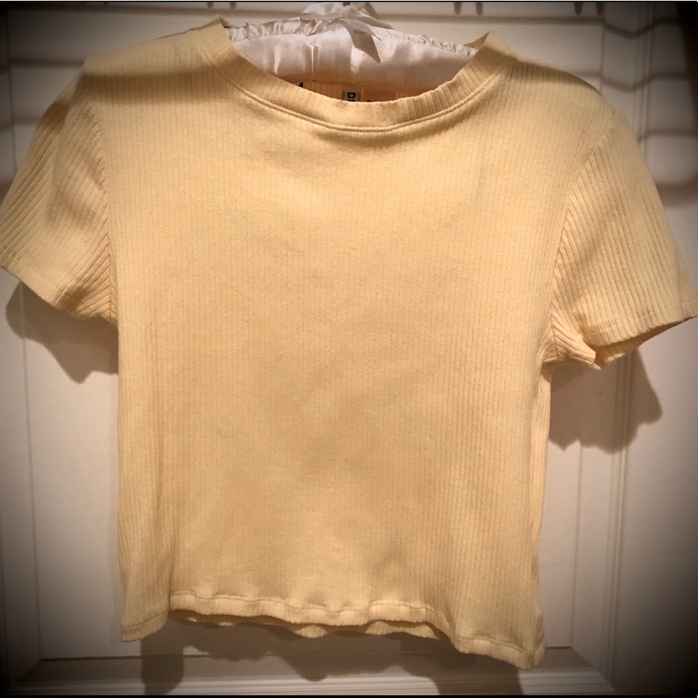 Light yellow crop top.